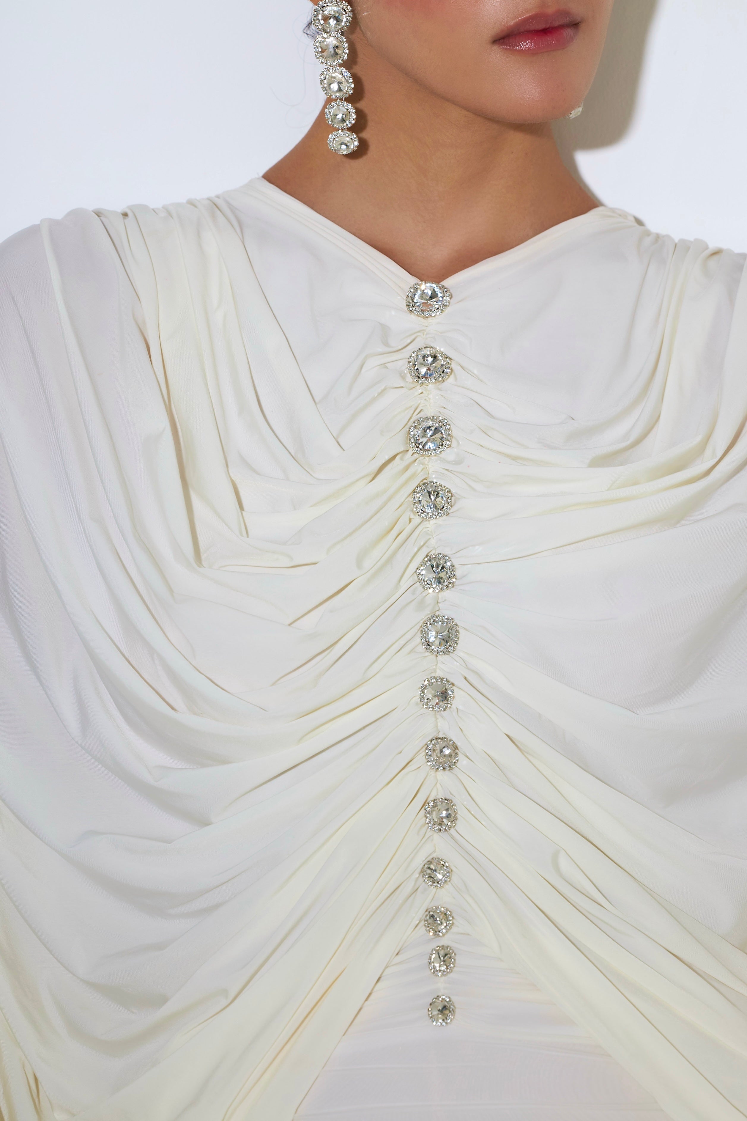 Crystal button detail on Alexa dress