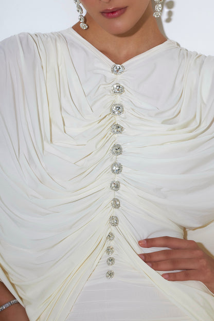 Crystal button detail on Alexa dress