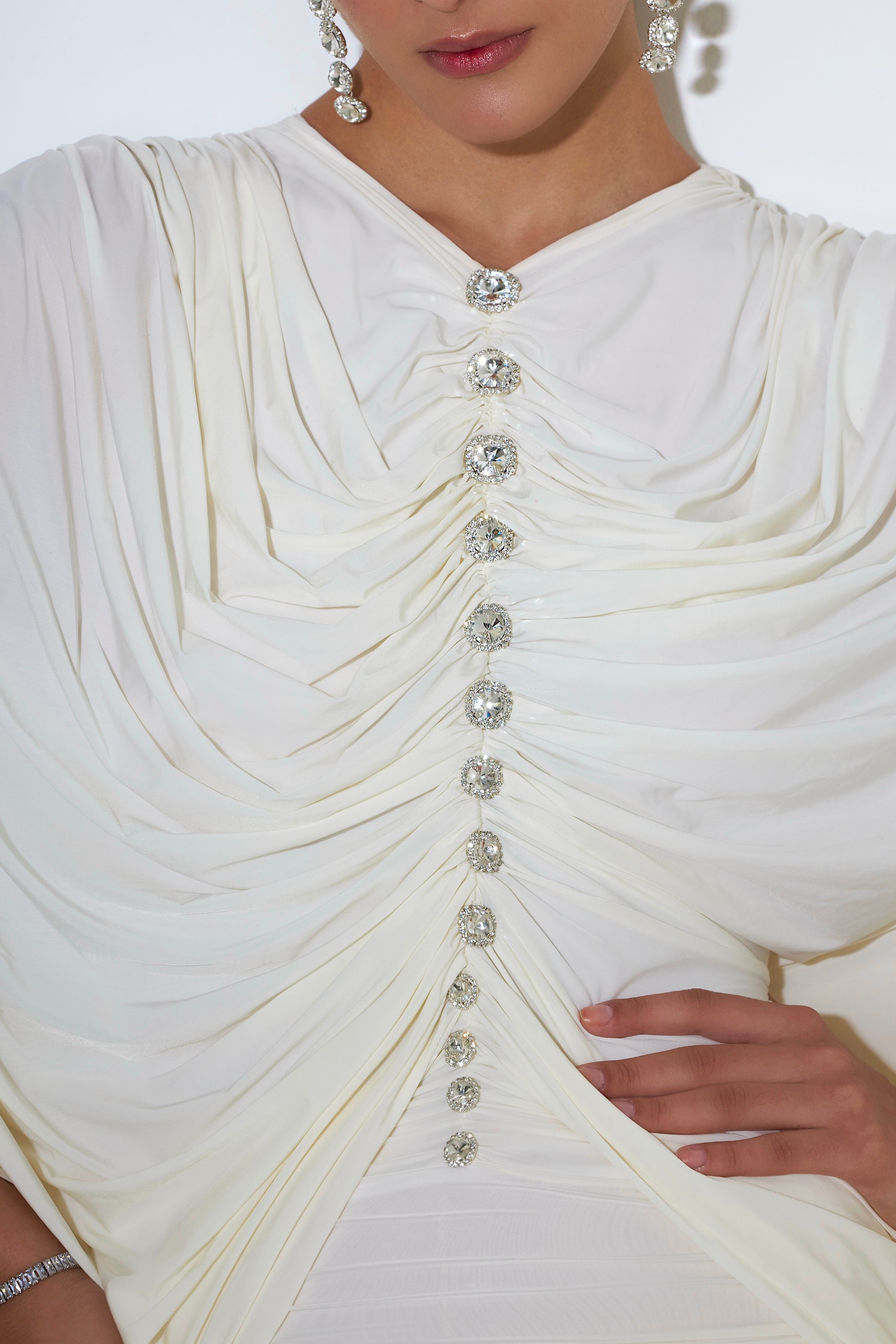 Crystal button detail on Alexa dress